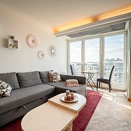 Cozy living room of Apartment Ravenna in Middelkerke, Belgian coast, with a beautiful view and modern decor.