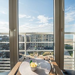 Enjoy the sea view from the balcony of Apartment Ravenna in Middelkerke on the Belgian coast, a perfect vacation rental.