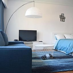 Stijlvolle woonkamer in Appartement in Woluwe-Saint-Lambert, Sint-Lambrechts-Woluwe, Brussel. Comfortabele inrichting met moderne accenten.