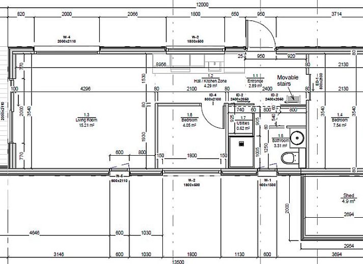 Gemuetliches Wohnzimmer im Ferienhaus in Ypern, mit Blick auf die gruene Landschaft Westflanderns, Belgien.