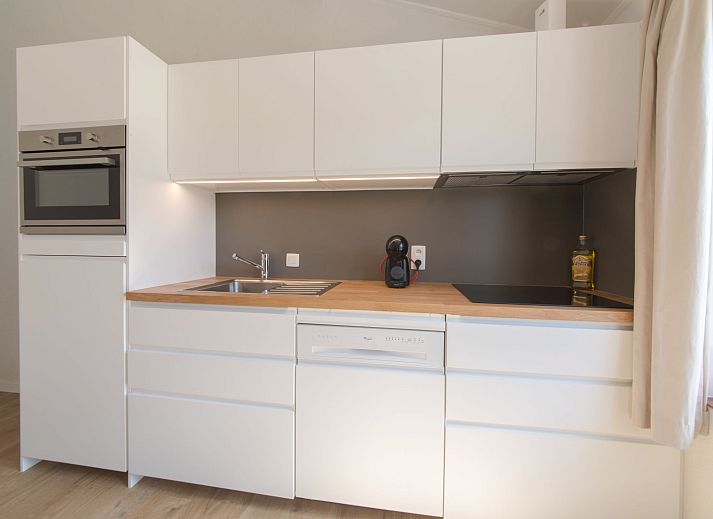 Ferienhaus Duinenhuisje 25 in De Haan, Westflandern mit sonniger Terrasse und Garten, ideal zum Entspannen und Geniessen der Natur.