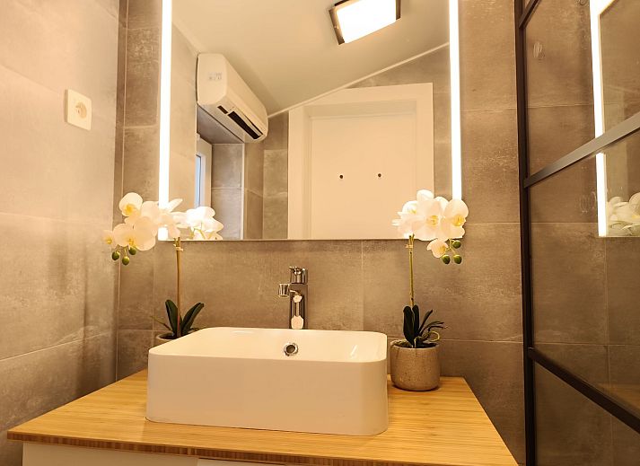 Geniessen Sie das Gemeinschaftsschwimmbad im Ferienhaus Duinenhuisje 25 in De Haan, Westflandern, ideal zum Entspannen und Erholen.