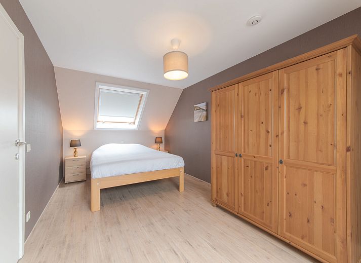 Gemuetliches Wohnzimmer im Ferienhaus Dagmar mit komfortabler Sitzecke, gelegen in De Haan, Westflandern, ideal fuer einen entspannten Aufenthalt.