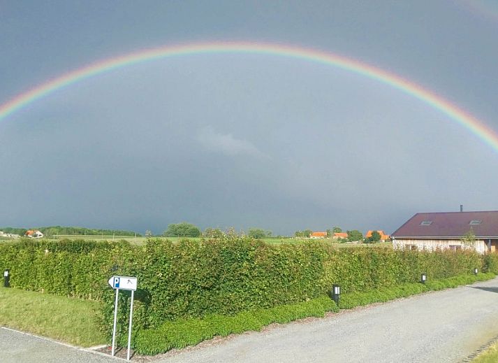 Cozy interior of AKKERNEST vacation home in Hill Country, with fireplace and comfortable seating area.
