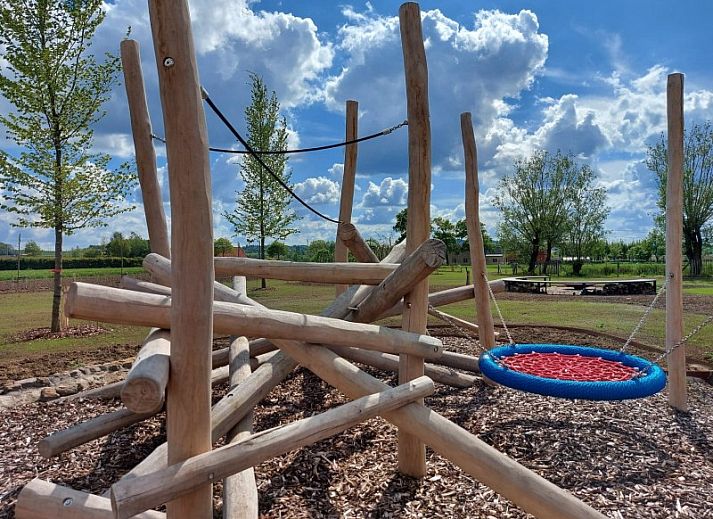 Stylish sitting area in AKKERNEST vacation home, Hill Country, with fireplace and modern furnishings.
