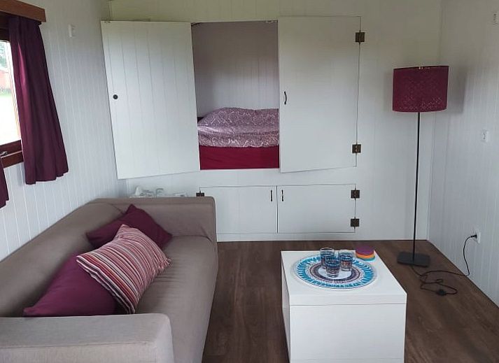 Modern kitchen in AKKERNEST vacation home, Hill Country, with spacious refrigerator and sleek storage.