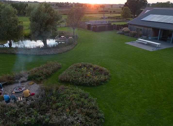 Modern kitchen in AKKERNEST vacation home, Hill Country, with spacious refrigerator and sleek storage.