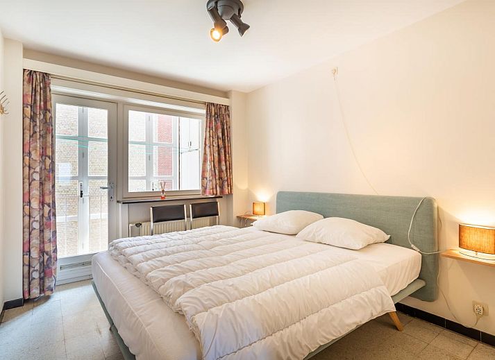 Uitzicht vanaf Courant du Golfe vakantiehuis in Koksijde, West-Vlaanderen, met strand en zee op de achtergrond.