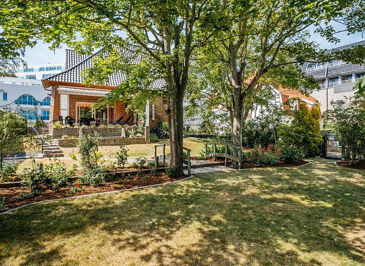 Porpoises vakantiehuis in Koksijde, West-Vlaanderen met een groene tuin en schaduwrijke veranda voor een ontspannen verblijf.