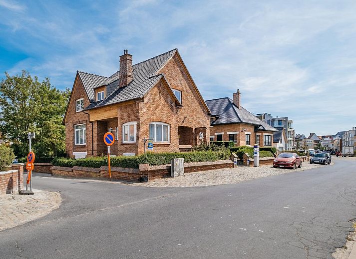 Porpoises vakantiehuis in Koksijde, West-Vlaanderen met een groene tuin en schaduwrijke veranda voor een ontspannen verblijf.