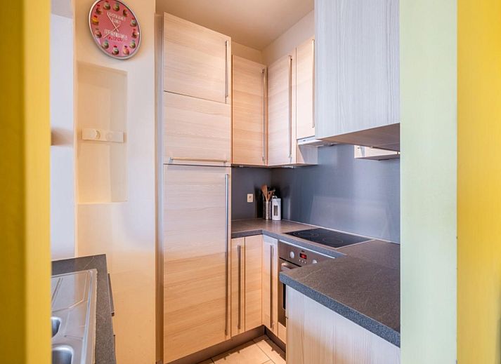 Vitelli vakantiehuis in Koksijde, West-Vlaanderen met uitzicht op duinen en strandpromenade, ideale plek voor een ontspannen strandvakantie.