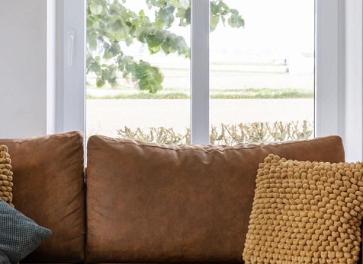 Von 't hov in Passendale hat man einen Blick auf weite gruene Felder und ruhige Landschaften.