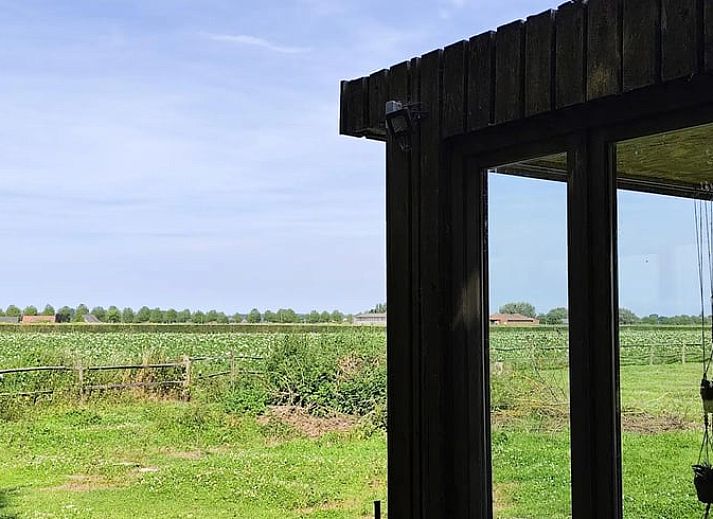 Spacious interior of Holiday home in Zarren with modern kitchen and comfortable sitting area in West Flanders, Belgium.