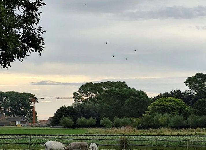 Spacious interior of Holiday home in Zarren with modern kitchen and comfortable sitting area in West Flanders, Belgium.