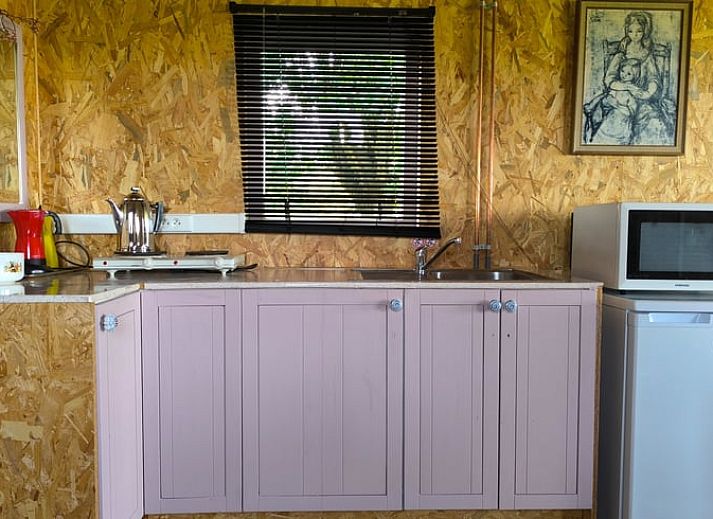 Spacious interior of Holiday home in Zarren with modern kitchen and comfortable sitting area in West Flanders, Belgium.