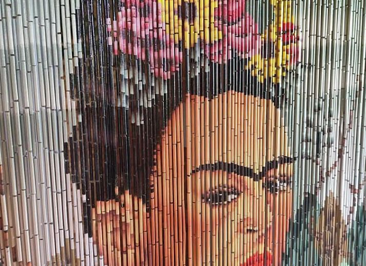 Rustic terrace with seating surrounded by nature at Holiday home in Zarren, West Flanders, Belgium.
