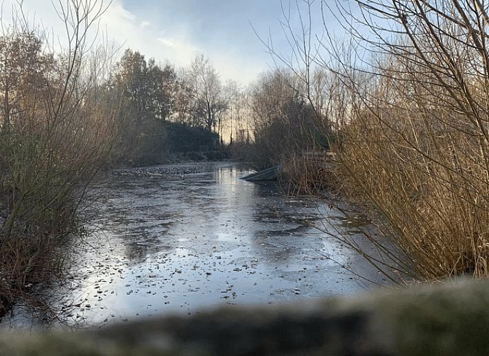 Attractive bedroom in Cottage in Alveringem, a vacation home in Alveringem, West Flanders, overlooking serene nature.