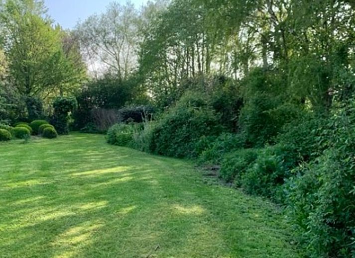 Attractive bedroom in Cottage in Alveringem, a vacation home in Alveringem, West Flanders, overlooking serene nature.