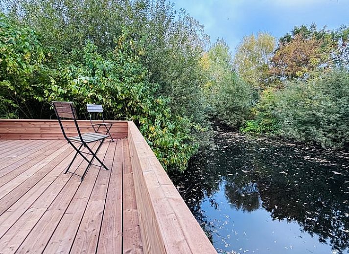 Modern bathroom in Cottage in Alveringem, a vacation home in Alveringem, West Flanders, with stylish sink and rustic look.