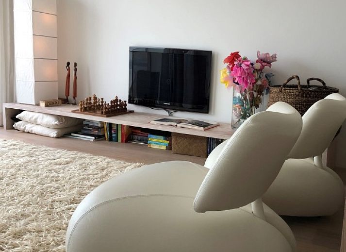 Geniet van het uitzicht op zee vanaf het balkon van Vakantie aan Zee appartement in Knokke-Heist, West-Vlaanderen.