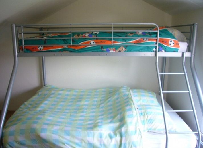 Veranda des Ferienhauses Lombardsijde in Lombardsijde-Middelkerke, Westflandern, Belgien mit bequemen Stuehlen.