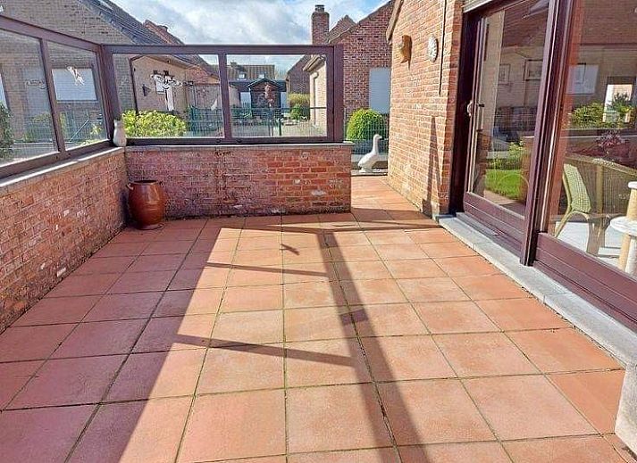 Cottage Mia-Kristina in Kristina Park, Westende with sunny brick facade and solar panels, vacation home in West Flanders, Belgium.