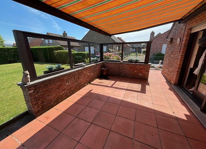Cottage Mia-Kristina in Kristina Park, Westende with sunny brick facade and solar panels, vacation home in West Flanders, Belgium.