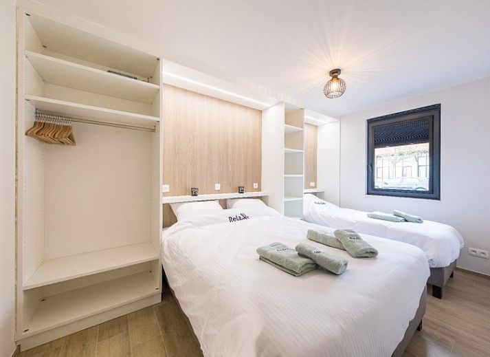 Modernes Aeusseres des Ferienhauses Relax in Westende/Middelkerke, Westflandern, mit schlichter Architektur.