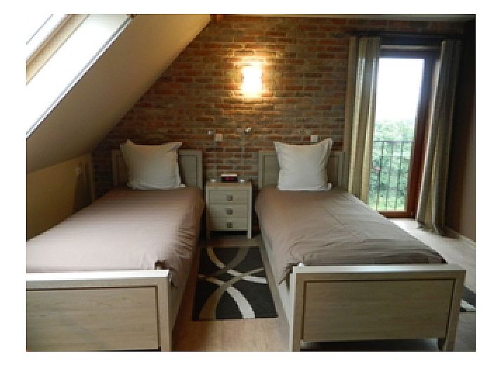 Oorlogsmuseum bij Varlet Farm bed and breakfast in Poelkapelle, met historische artefacten en wapens.