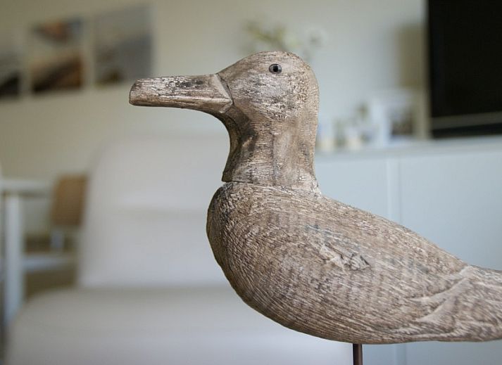 Cozy sitting area in Residence Noordhinder apartment, De Panne, Belgian coast, with comfortable chairs and modern furnishings.