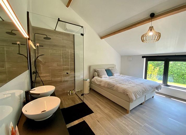 Petunias Deluxe-Ferienhaus in Sint-Idesbald, Westflandern, mit sonnigem Garten und traditioneller Architektur fuer einen entspannten Aufenthalt.