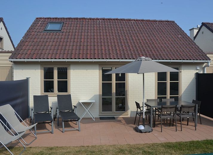 Gemuetliches Wohnzimmer im Ferienhaus Wenduine in Wenduine, Belgien, mit moderner Einrichtung und bequemer Sitzecke.