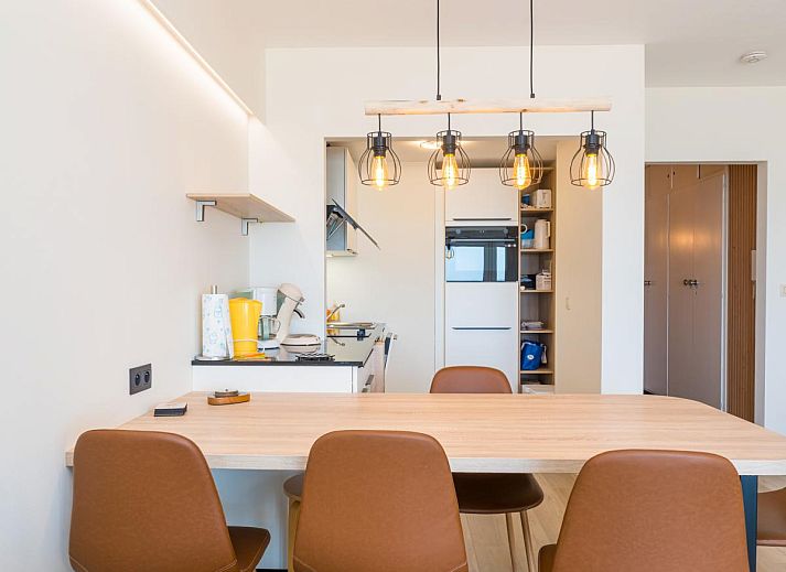 Gemuetliches Interieur des Ferienhauses Reno - 0701 in Middelkerke, Westflandern, mit moderner Einrichtung und komfortabler Sitzecke.