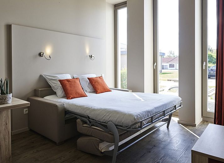 Gemuetliches Innenstudio fuer Familien in Middelkerke, Westflandern. Ideales Ferienhaus fuer Familien mit Blick auf den Garten.