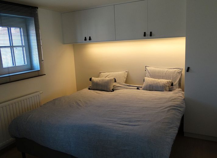 Helmgras vakantiehuis in Middelkerke met praktische keukenopslag, glazen potten voor ingredienten in West-Vlaanderen.