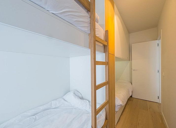 Gemuetliches Wohnzimmer im Ferienhaus Jamani - 0101, Middelkerke, mit moderner Einrichtung und komfortabler Sitzecke in Westflandern, Belgien.