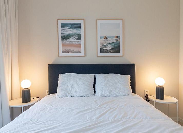 Genieten van het zwembad bij vakantiehuis West Bay in Westende, West-Vlaanderen, Belgie, met uitzicht op de natuur en ontspannende sfeer.