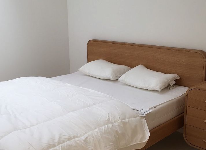 Vooraanzicht van Aan't zeetje - Westende appartement in West-Vlaanderen, Belgie met moderne gevel.