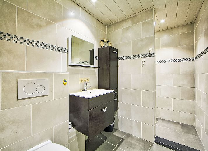 Stylish living room in Apartment Apt. 403 in Bredene, West Flanders, Belgium, featuring modern furnishings and comfortable seating.