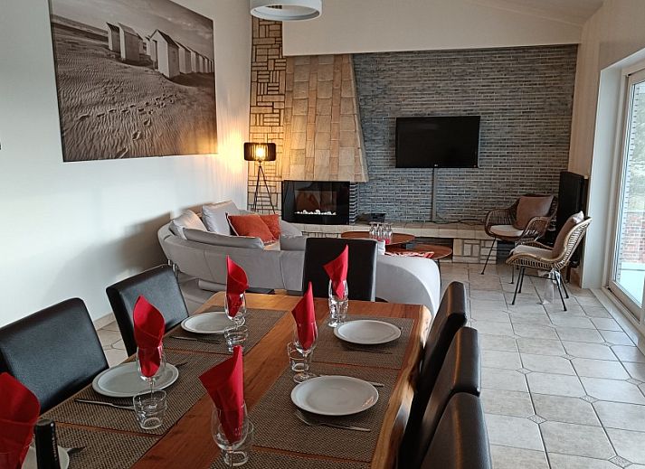 Papa's Dream vacation home in Oostduinkerke with stone facade and spacious driveway in West Flanders, Belgium.