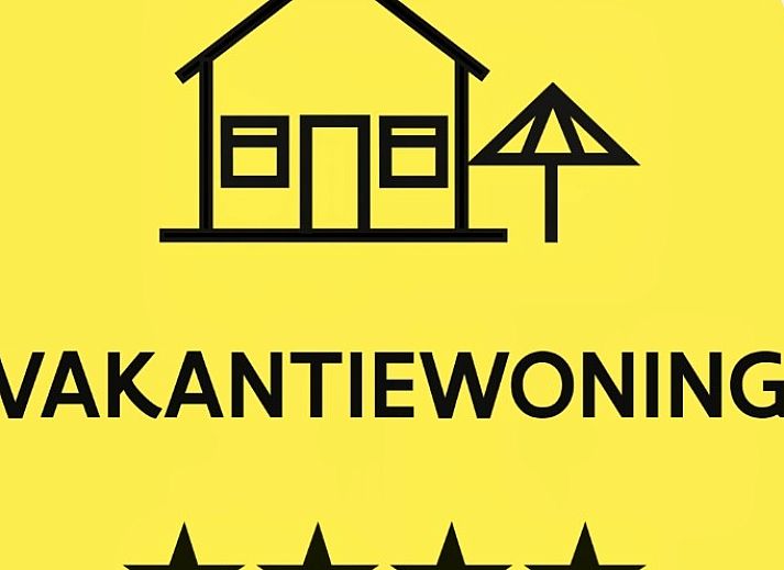 Aussenansicht des Ferienhauses Het Anker in Oostduinkerke, mit moderner Architektur und sonnigem Garten.