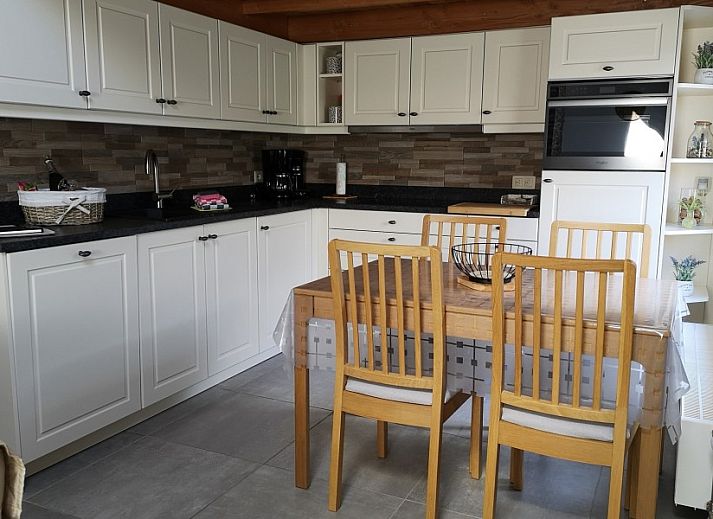 Willkommensschild im Fisherman's House Caroline, einem gemuetlichen Ferienhaus in Oostduinkerke, Westflandern.