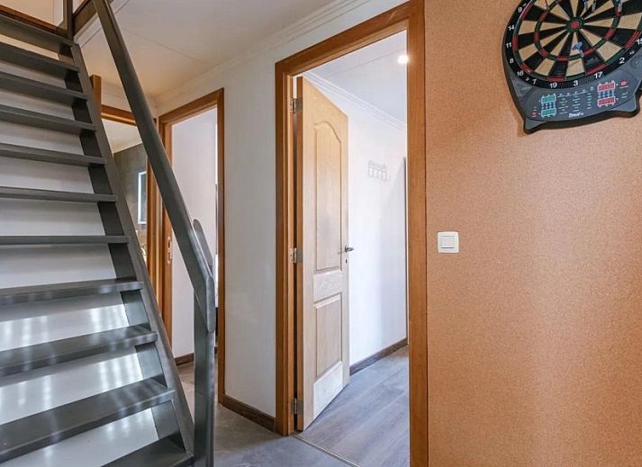 Stylish kitchen with island in Maison du coeur, vacation home in Oostduinkerke, West Flanders.