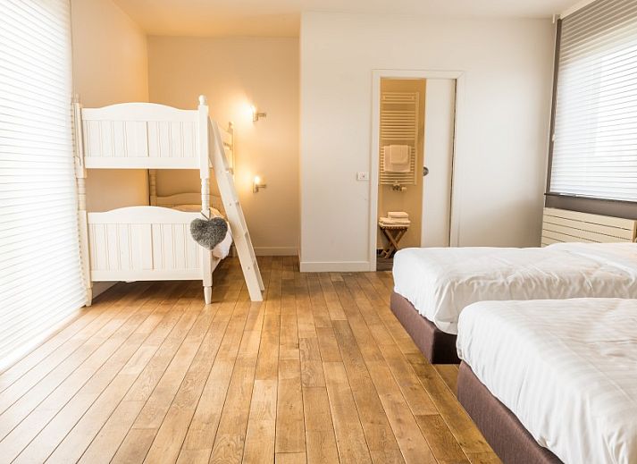 Ingang van De Oude Klei, luxe vakantiehuis in Vlaamse Ardennen met stijlvolle decoratie.