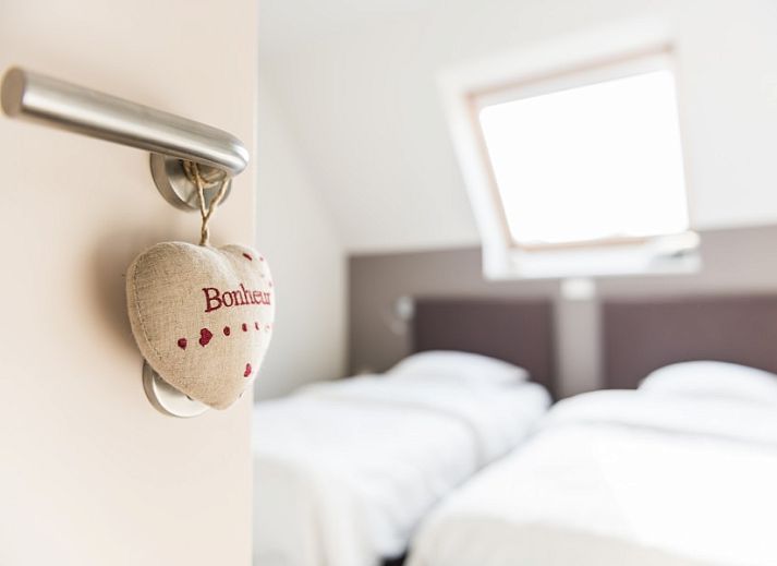 Ingang van De Oude Klei, luxe vakantiehuis in Vlaamse Ardennen met stijlvolle decoratie.