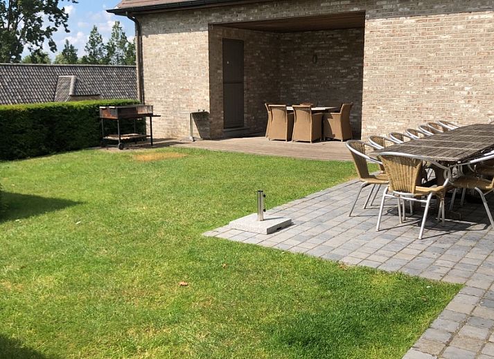 Gezellige woonkamer in De Oude Klei, luxe vakantiewoning in Oost-Vlaanderen, Belgie.