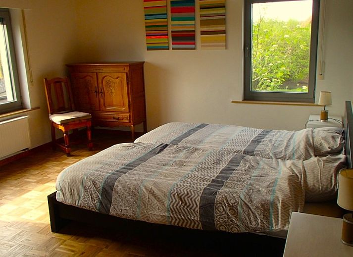 Uitzicht op groene velden rond Vakantiehuis De Rekelberg in Michelbeke, Oost-Vlaanderen