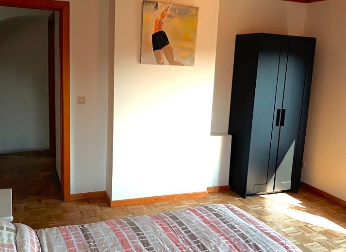 Uitzicht op groene velden rond Vakantiehuis De Rekelberg in Michelbeke, Oost-Vlaanderen