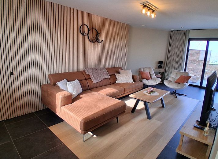 't Laarhuys ***** vakantiehuis in Vlaamse Ardennen, Oost-Vlaanderen met prachtig terras en uitzicht op groene velden.