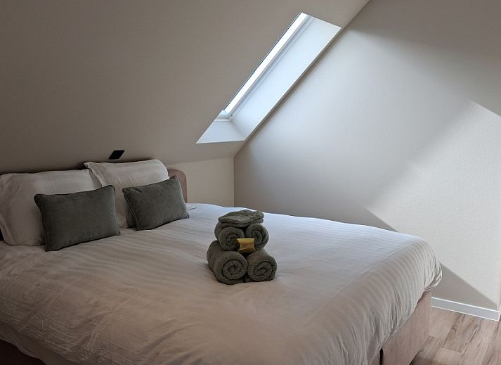 't Laarhuys ***** in Vlaamse Ardennen, Belgie biedt een moderne keuken in een luxe vakantiehuis met prachtig uitzicht op de omgeving.
